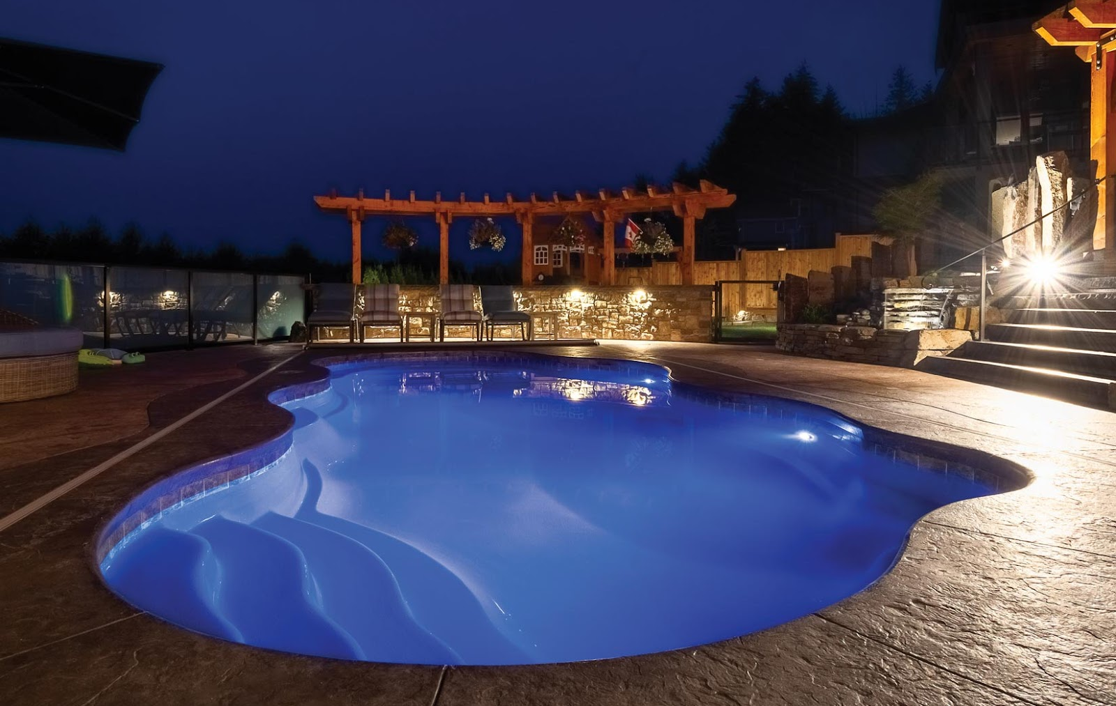 A beautiful inground pool is chosen by homeowners. Other options were a semi-inground pool and an above ground pool for their backyard.