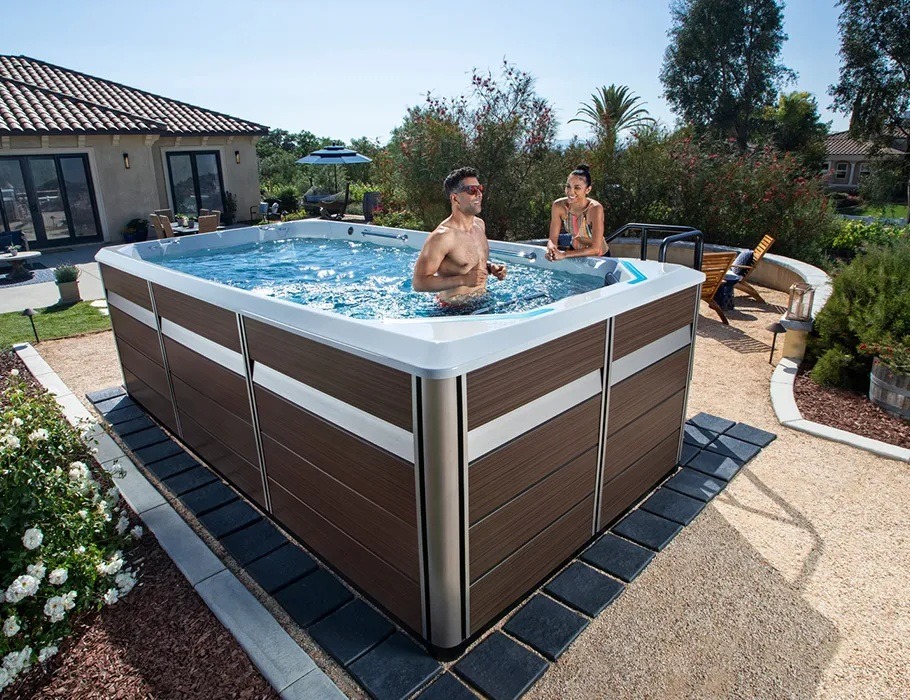 A man runs in an Endless Pools swim spa. Swim spas for sale are where fitness meets relaxation.